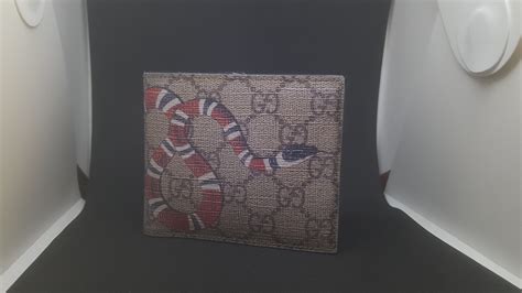 Gucci Snake Wallet from Nina, two years in. (and a thank you